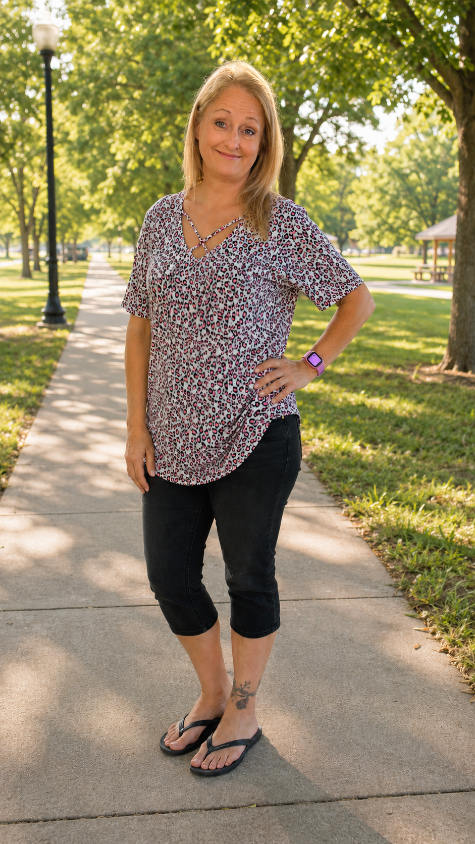 HEIMISH SHORT SLEEVE CRISS-CROSS VNECK ANIMAL PRINT BABYDOLL TOP